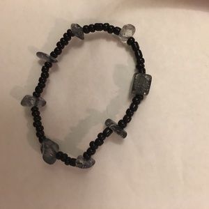 This bracelet is made of string